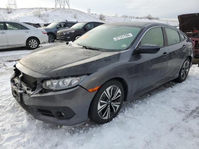 HONDA CIVIC EX 2018 with VIN JHMFC1F38JX042822 - Photo from auction