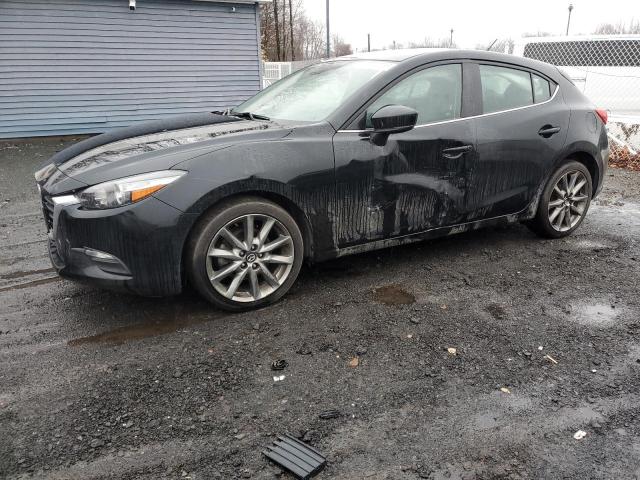 MAZDA 3 TOURING 2018 with VIN 3MZBN1L31JM214495 - Photo from auction