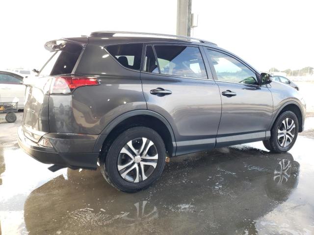 Photo 3 from auction – 2017 TOYOTA RAV4 LE with VIN JTMZFREV0HJ710911
