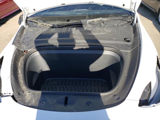 Photo 11 from auction – 2021 TESLA MODEL Y with VIN 5YJYGAEE8MF150941