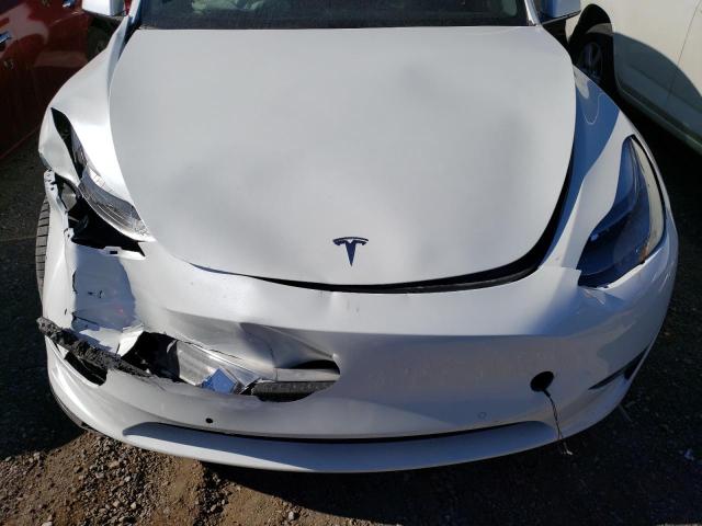 Photo 11 from auction – 2022 TESLA MODEL Y with VIN 7SAYGDEF9NF388585