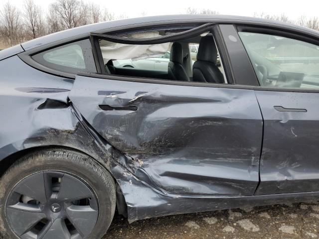 Photo 10 from auction – 2022 TESLA MODEL 3 with VIN 5YJ3E1EA2NF288425