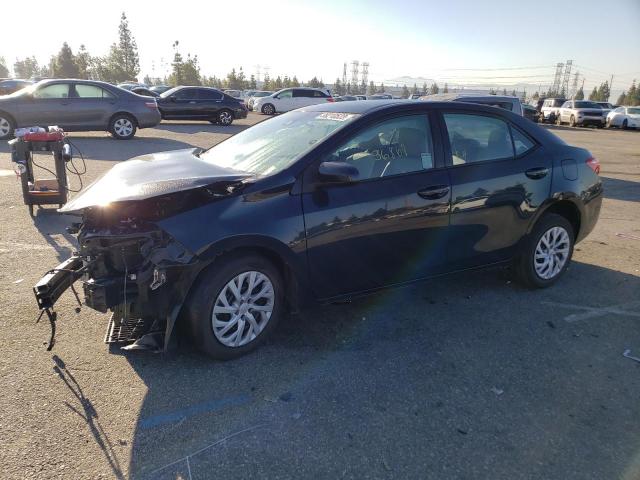 TOYOTA COROLLA L 2017 with VIN 5YFBURHE9HP711604 - Photo from auction