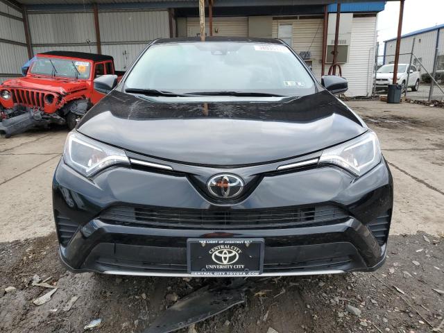 Photo 5 from auction – 2018 TOYOTA RAV4 LE with VIN 2T3BFREV6JW831838