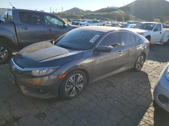 HONDA CIVIC EX 2016 with VIN 2HGFC1F3XGH659008 - Photo from auction