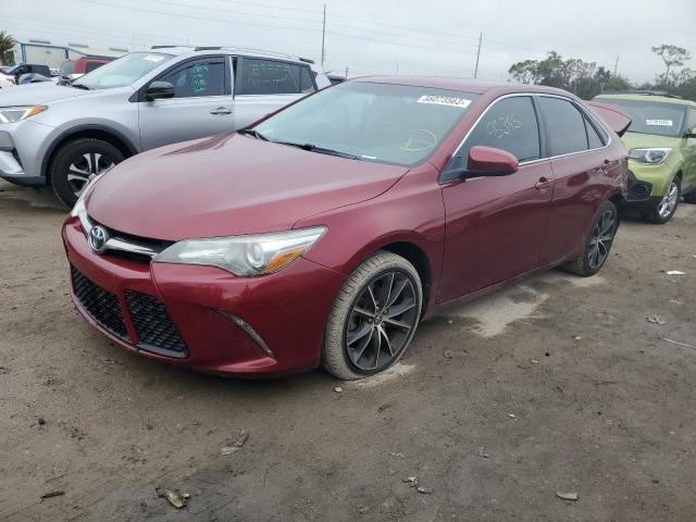 TOYOTA CAMRY LE 2017 with VIN 4T1BF1FK1HU686717 - Photo from auction