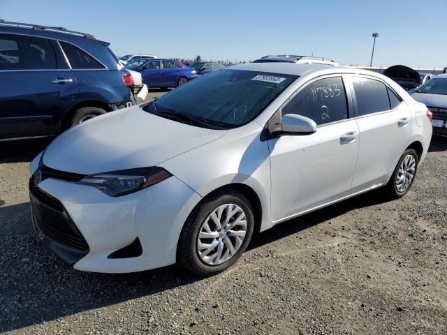 TOYOTA COROLLA L 2018 with VIN 5YFBURHE9JP747833 - Photo from auction