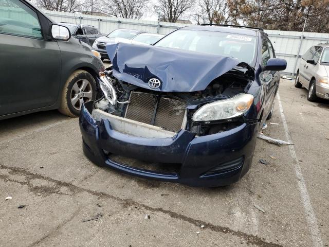 TOYOTA COROLLA MA 2009 with VIN 2T1KU40E99C177102 - Photo from auction