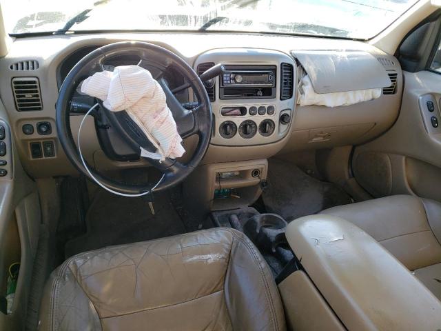 Photo 8 from auction – 2003 FORD ESCAPE LIM with VIN 1FMCU04143KD09169