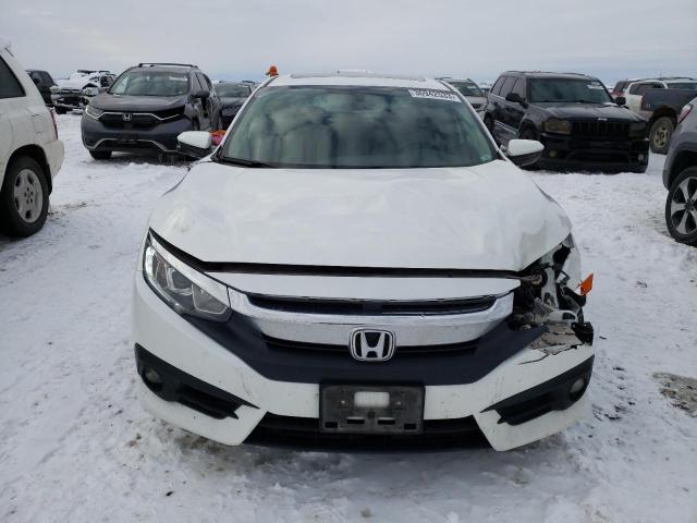 Photo 5 from auction – 2017 HONDA CIVIC EX with VIN 19XFC1F34HE031909