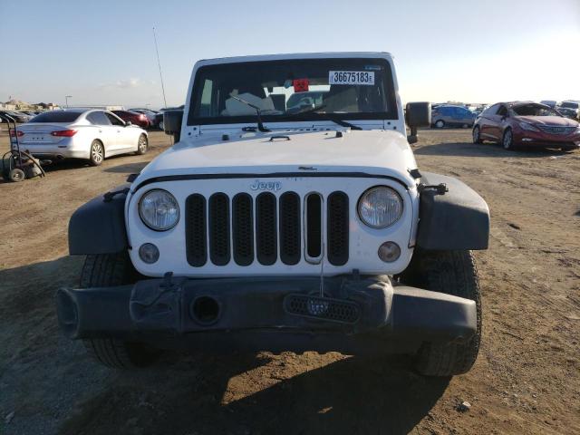 Photo 5 from auction – 2015 JEEP WRANGLER S with VIN 1C4AJWAG0FL523011