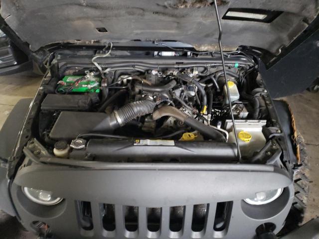 Photo 11 from auction – 2010 JEEP WRANGLER U with VIN 1J4BA5H12AL145406