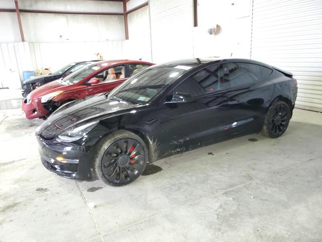 TESLA MODEL 3 2022 with VIN 5YJ3E1EC5NF240631 - Photo from auction