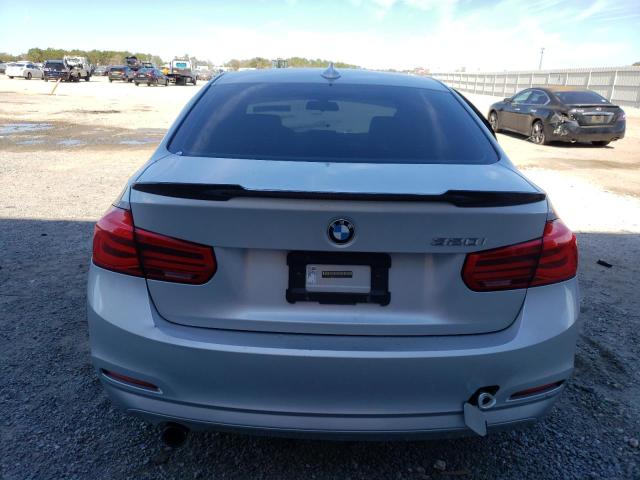 Снимка 6 от търг – 2016 BMW 320 I с VIN WBA8E1G58GNT99441