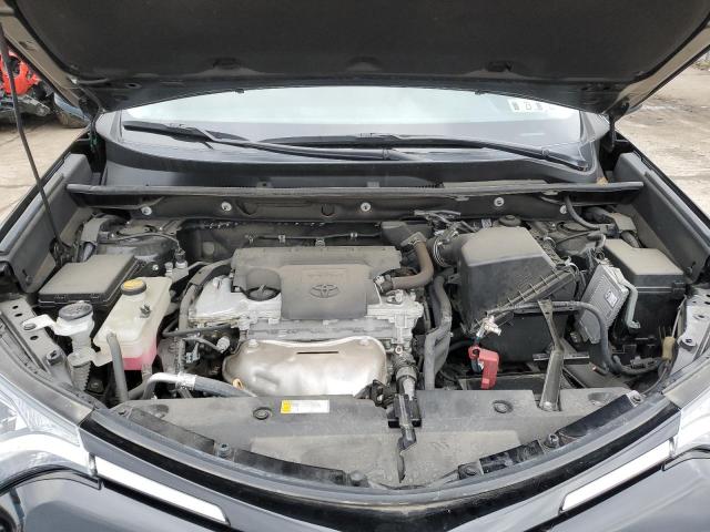 Photo 11 from auction – 2018 TOYOTA RAV4 LE with VIN 2T3BFREV6JW831838