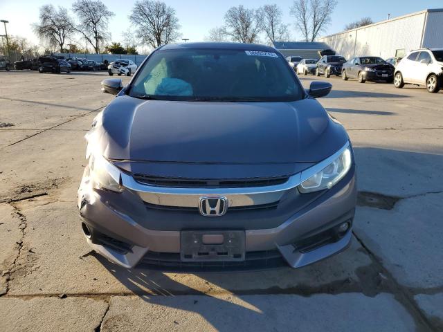Photo 5 from auction – 2016 HONDA CIVIC EX with VIN 19XFC1F38GE216060