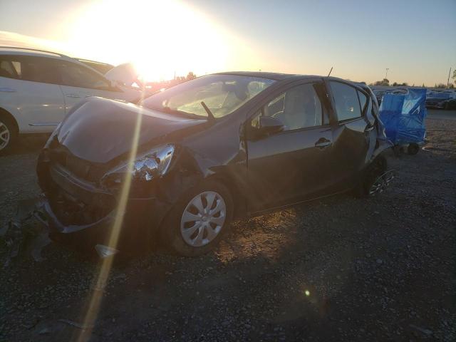 TOYOTA PRIUS C 2014 with VIN JTDKDTB35E1571118 - Photo from auction