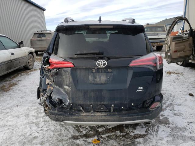 Photo 6 from auction – 2018 TOYOTA RAV4 SE with VIN JTMJFREV0JD251655