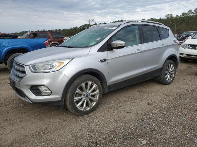 FORD ESCAPE TIT 2017 with VIN 1FMCU0J96HUA63151 - Photo from auction