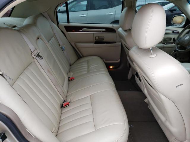 Photo 10 from auction – 2004 LINCOLN TOWN CAR E with VIN 1LNHM81W24Y677417