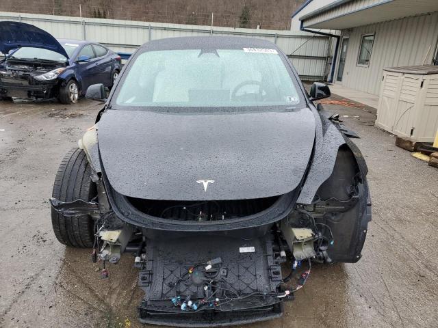 Photo 5 from auction – 2021 TESLA MODEL 3 with VIN 5YJ3E1EB2MF019994