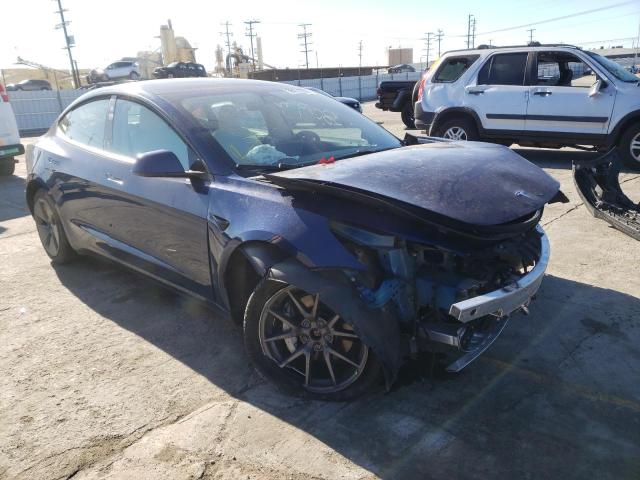 Photo 4 from auction – 2021 TESLA MODEL 3 with VIN 5YJ3E1EB5MF879405