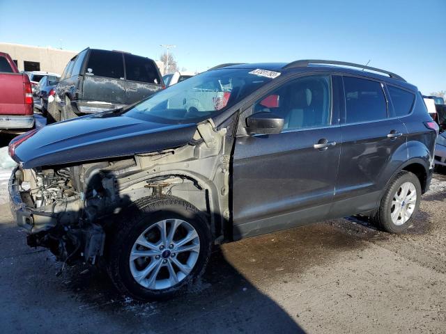 FORD ESCAPE SE 2018 with VIN 1FMCU9GD0JUB02113 - Photo from auction