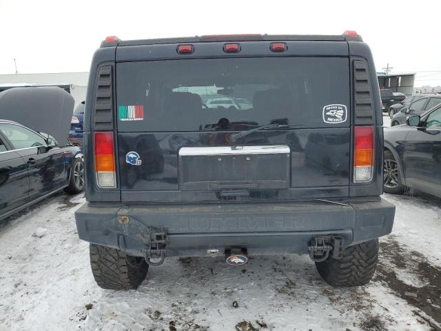 Photo 6 from auction – 2003 HUMMER H2 with VIN 5GRGN23U73H102992