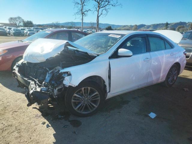 TOYOTA CAMRY LE 2017 with VIN 4T1BF1FKXHU793216 - Photo from auction