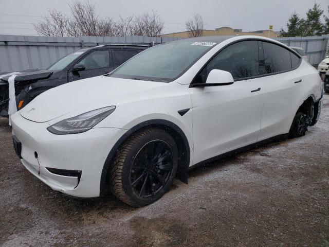 TESLA MODEL Y 2022 with VIN 7SAYGDEE9NF377996 - Photo from auction