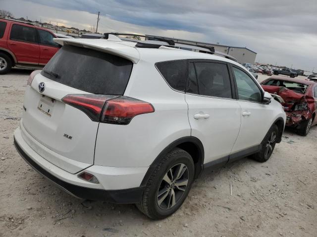 Photo 3 from auction – 2017 TOYOTA RAV4 XLE with VIN 2T3WFREV6HW334705