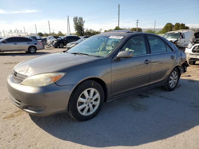 TOYOTA CAMRY LE A 2002 with VIN 4T1BF30K72U510640 - Photo from auction