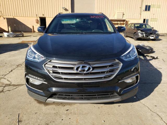 Photo 5 from auction – 2017 HYUNDAI SANTA FE S with VIN 5NMZU3LB2HH046659