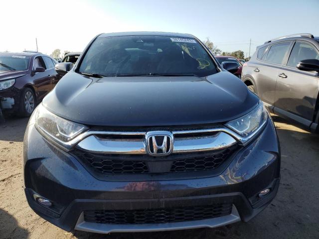Photo 5 from auction – 2018 HONDA CR-V EX with VIN 7FARW2H50JE034013