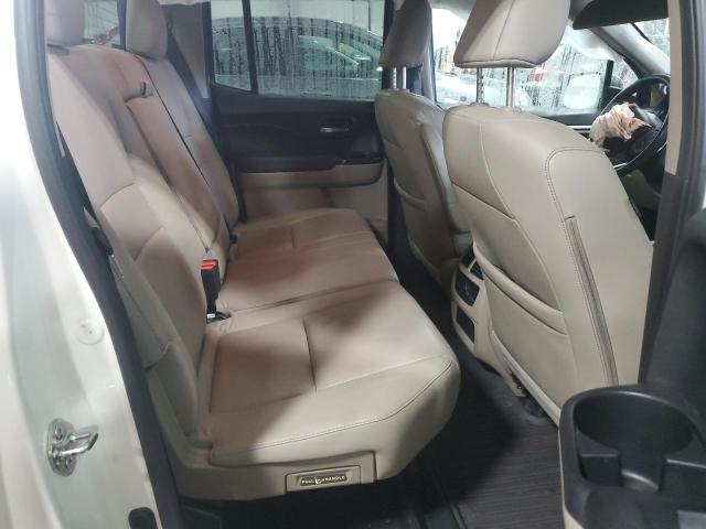 Photo 10 from auction – 2018 HONDA RIDGELINE with VIN 5FPYK3F66JB004574