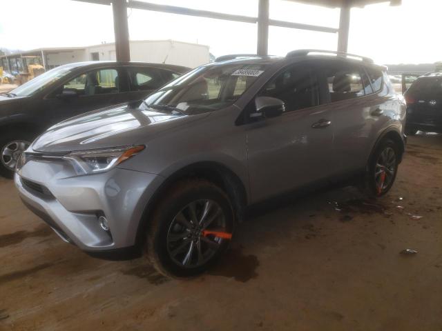 TOYOTA RAV4 LIMIT 2018 with VIN JTMYFREV2JD119009 - Photo from auction