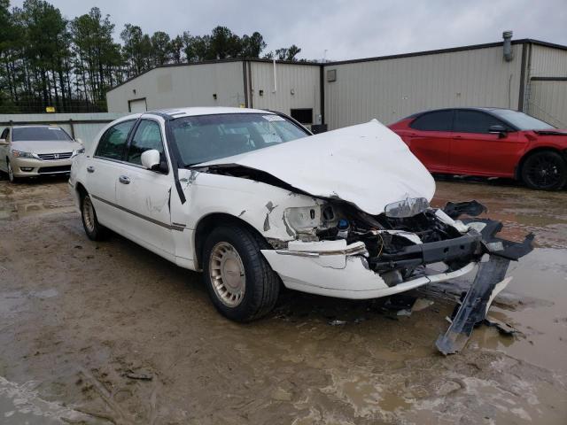 Zdjęcie 4 z aukcji – 2000 LINCOLN TOWN CAR E z VIN 1LNHM81W7YY852914