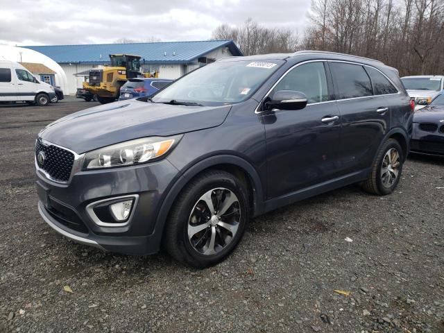 KIA SORENTO EX 2016 with VIN 5XYPH4A59GG051168 - Photo from auction