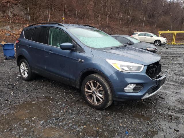 Photo 4 from auction – 2018 FORD ESCAPE SE with VIN 1FMCU9GD4JUB01644