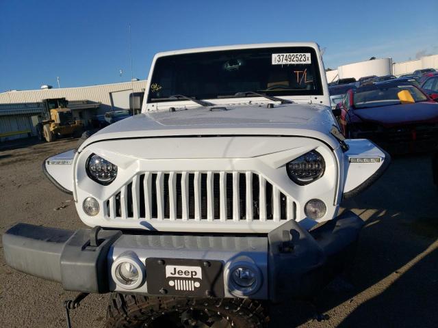 Photo 5 from auction – 2014 JEEP WRANGLER U with VIN 1C4BJWEG7EL188102