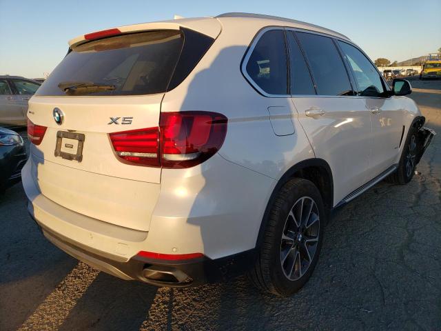 Photo 3 from auction – 2016 BMW X5 XDRIVE5 with VIN 5UXKR6C55G0J80982
