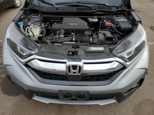 Photo 12 from auction – 2018 HONDA CR-V with VIN 7FARW2H80JE084176