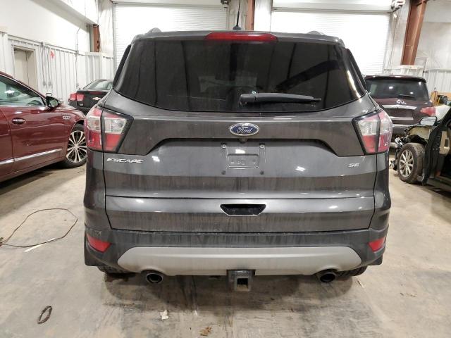 Photo 6 from auction – 2018 FORD ESCAPE SE with VIN 1FMCU9GD7JUD34840