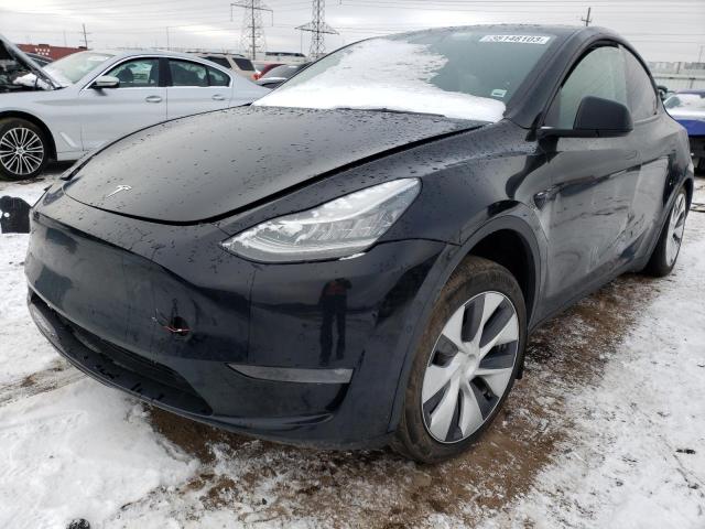 TESLA MODEL Y 2022 with VIN 7SAYGAEE0NF328166 - Photo from auction