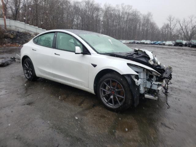 Photo 4 from auction – 2021 TESLA MODEL 3 with VIN 5YJ3E1EB7MF063490