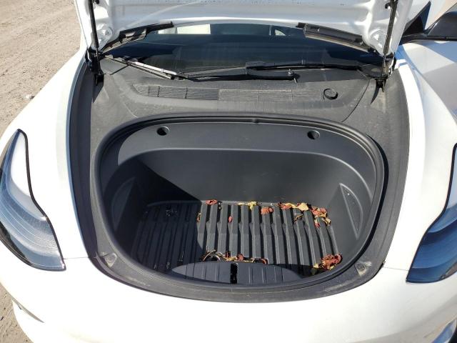 Photo 11 from auction – 2022 TESLA MODEL 3 with VIN 5YJ3E1ECXNF203588