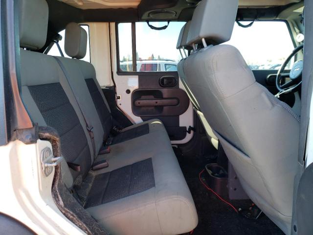 Photo 11 from auction – 2010 JEEP WRANGLER U with VIN 1J4BA3H16AL124627