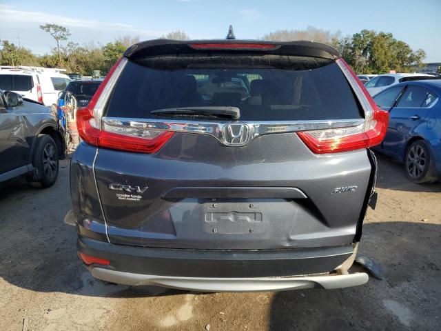 Photo 6 from auction – 2018 HONDA CR-V EX with VIN 7FARW2H50JE034013
