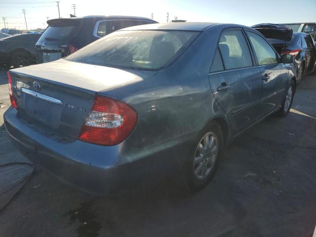Photo 3 from auction – 2002 TOYOTA CAMRY LE with VIN JTDBE30K120047974