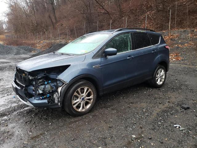 FORD ESCAPE SE 2018 with VIN 1FMCU9GD4JUB01644 - Photo from auction